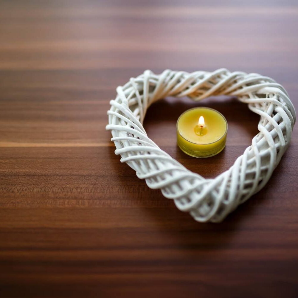 a candle with a heart